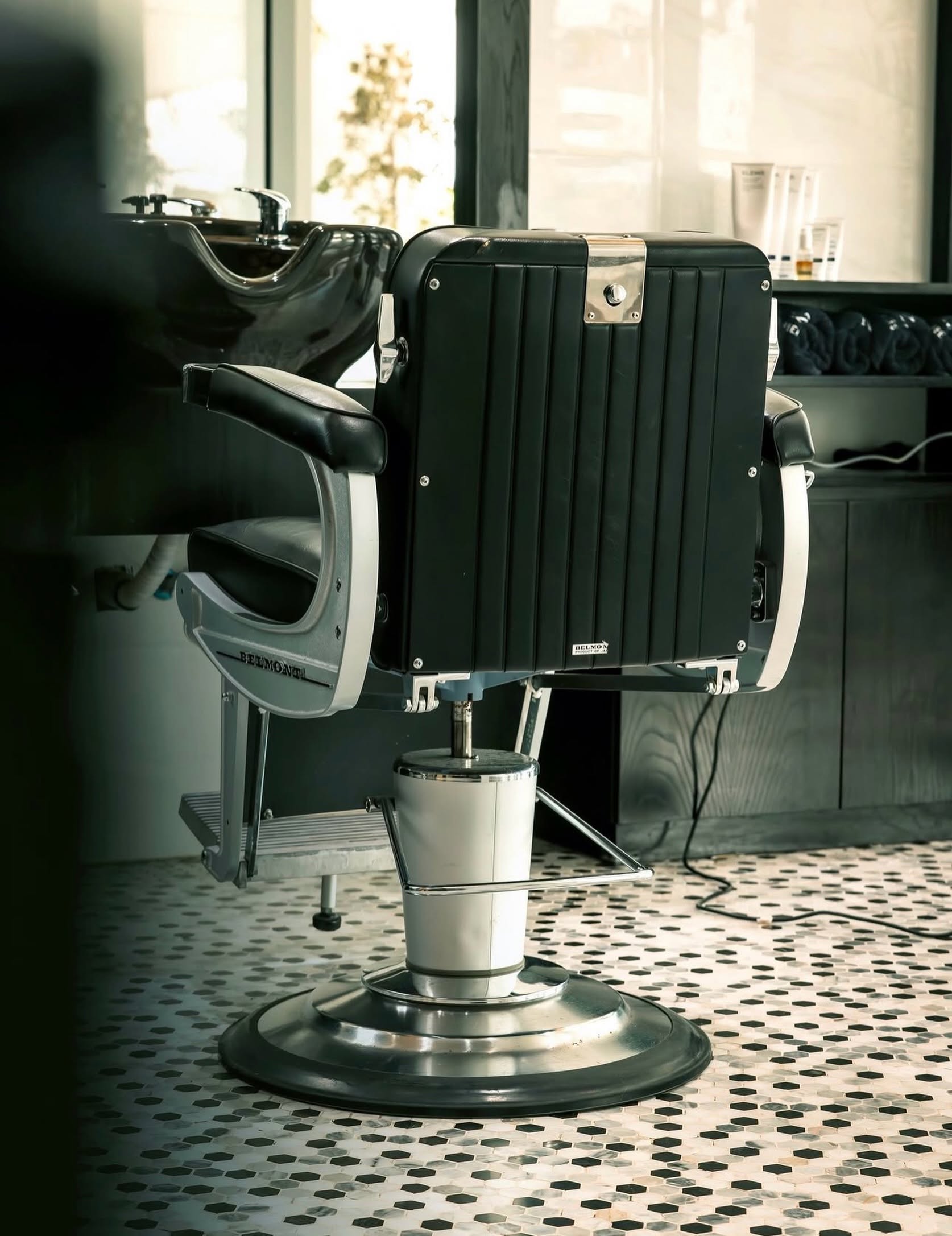 Classic barber chair and basin inside Razor Style Barber
